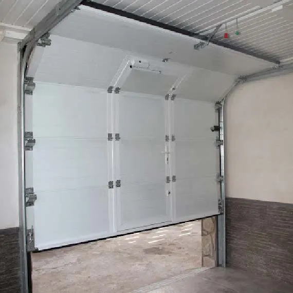 puertas garaje seccionales conmpas 570x570 1 - Instalación y Reparación Puertas de Garaje Seccionales
